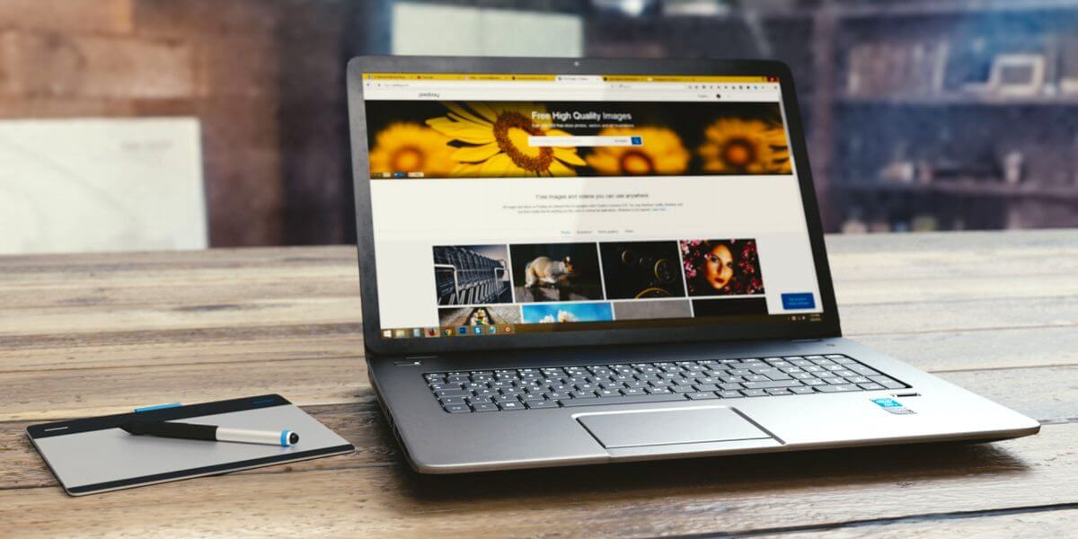laptop on desk doing web design